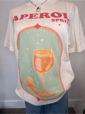 Aperol Cream Tee with Distressed Red Graphic
